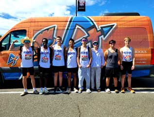 sidebargraphic_calendar1 Athletes lined up in front of the school vehicle