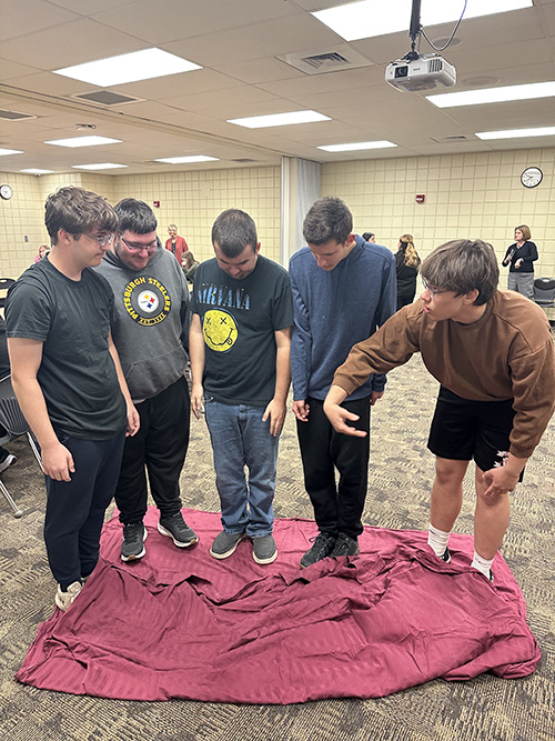 Group of student working together during a career pathways assignment