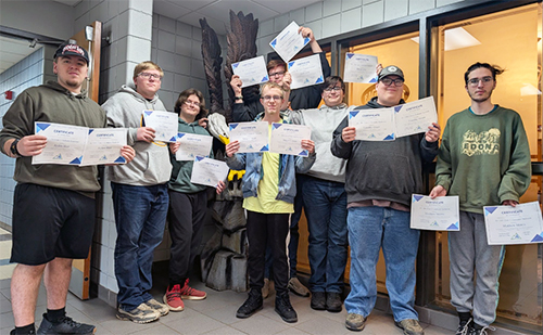 Students in Mr. Bryant’s networking class holding prestigious industry certifications