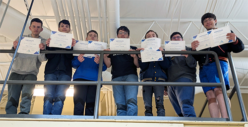 Students in Mr. Bryant’s networking class holding prestigious industry certifications